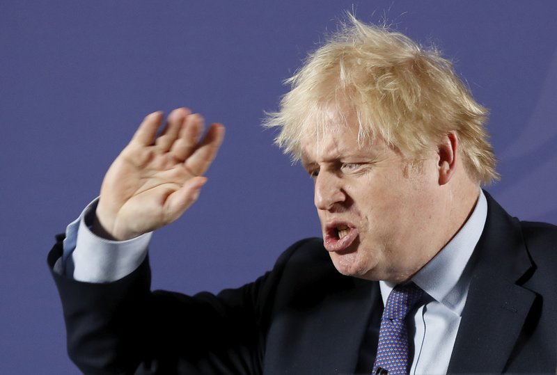 British Prime Minister Boris Johnson outlines his government's negotiating stance with the European Union after Brexit, during a key speech at the Old Naval College in Greenwich, London, Monday, Feb. 3, 2020. 