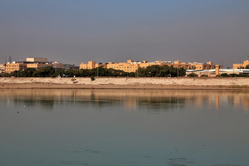 FILE - In this Friday, Jan. 3, 2020, file photo, U.S. Embassy is seen from across the Tigris River in Baghdad, Iraq. Iran has had its fingers in Iraq's politics for years, but the U.S. killing of an Iranian general and Iraqi militia commander outside Baghdad has added new impetus to the effort, stoking anti-Americanism that Tehran now hopes it can exploit to help realize the goal of getting U.S. troops out of the country. 