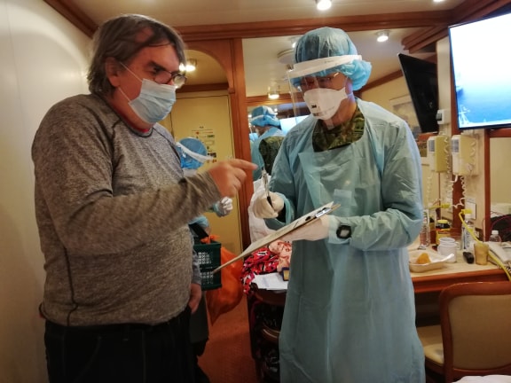 Julien Bergeron, left, tested positive for the virus.