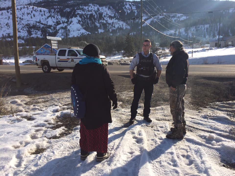 Police attend the scene of a rail blockade between Kamloops and Chase on Thursday, Feb. 20, 2020. 