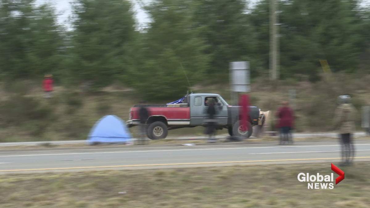 Video from another angle shows the truck smashing into what appears to be a plywood sheed.