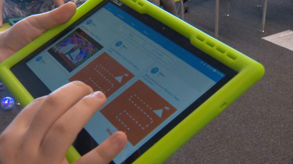 The girls used tablets to manipulate the speed, sound, and colour of the robotic spheres.