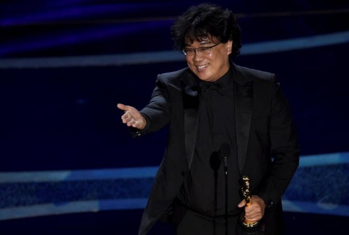Bong Joon Ho accepts the award for best director for "Parasite" at the Oscars on Sunday, Feb. 9, 2020, at the Dolby Theatre in Los Angeles.