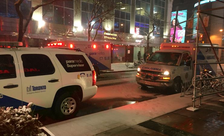 Paramedics attend the Toronto Public Health office on Victoria Street Wednesday evening.