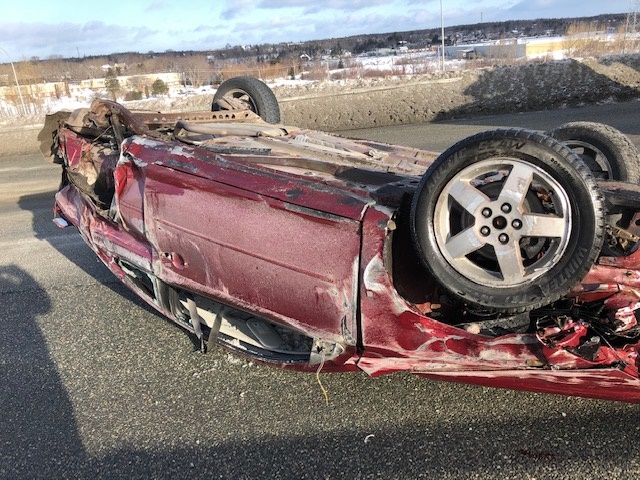 A red Chevy Cobalt had flipped over on Hwy. 125, westbound at Exit 6.