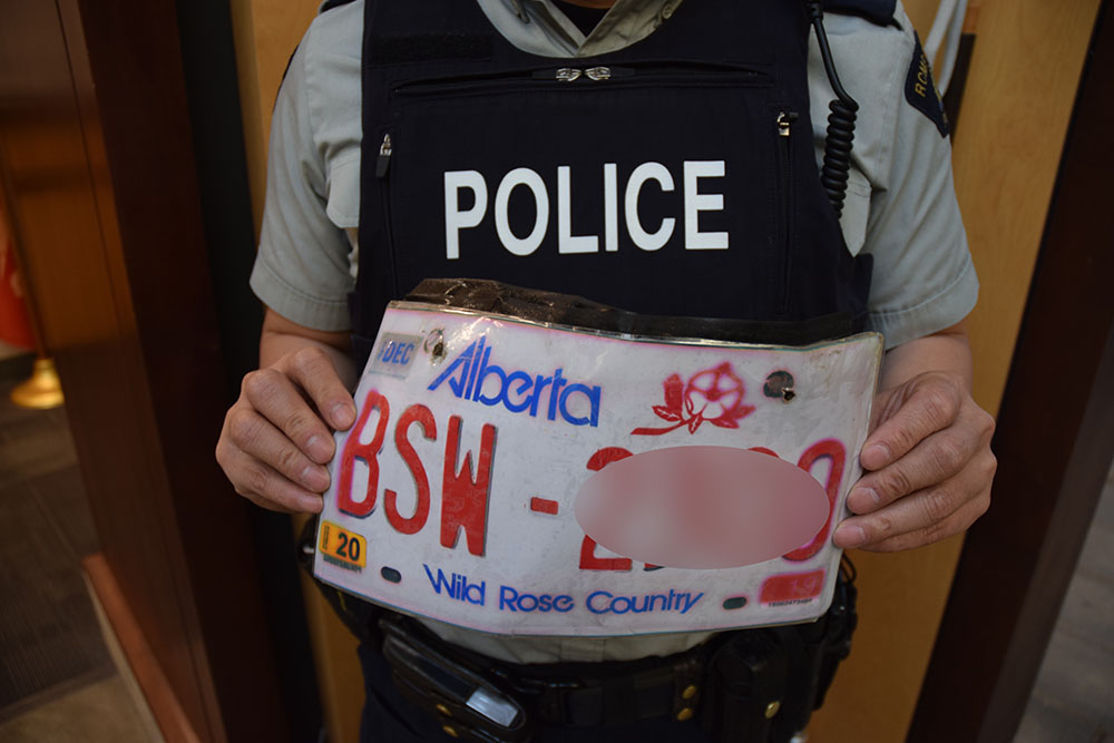 RCMP have released a photo of a printed-off licence plate from a vehicle involved in a collision in Port Coquitlam, B.C.