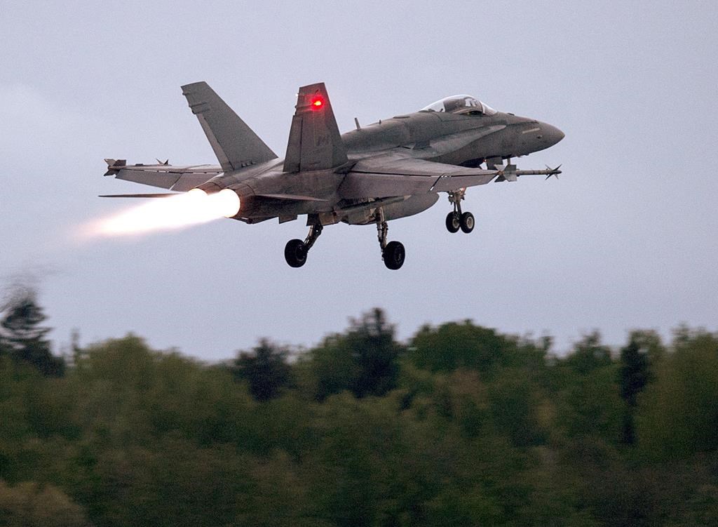 An RCAF CF-18 takes off from CFB Bagotville, Que. on Thursday, June 7, 2018. 