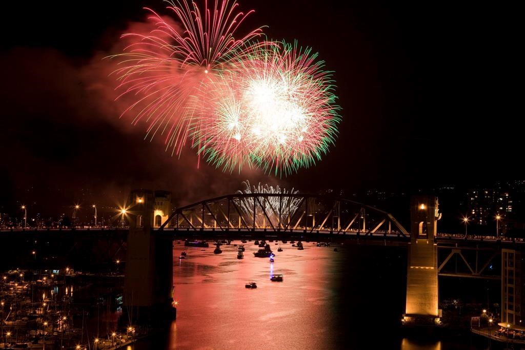 The Burrard Street Bridge is seen in the foreground as fireworks from team China blast over the waters of English Bay during the Celebration of Light in Vancouver on July 30, 2011. A Nova Scotia city councillor is pushing for a quietening down of fireworks in Atlantic Canada's largest city out of concern the sounds are alarming veterans and people on the autism spectrum. However, some in the pyrotechnics industry say the idea is likely to fizzle when the City of Halifax views the high costs, while a veteran with PTSD notes not all people with wartime traumas react badly to the shows. 