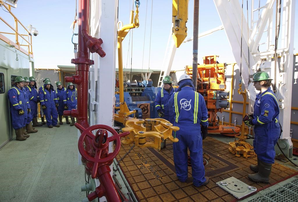 Trainees learn to lay down drill pipe on a rig floor at Precision Drilling in Nisku, Alta., on Friday, January 20, 2016. Shares in Precision Drilling Corp. jumped by 10 per cent on the Toronto Stock Exchange Thursday after it reported fourth-quarter revenue and earnings that beat expectations.