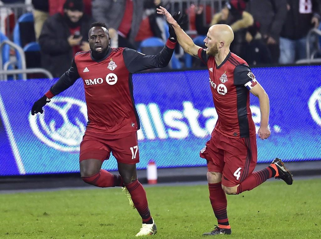 Toronto FC forward Jozy Altidore (17) celebrates his goal with teammate Michael Bradley (4) during second half CONCACAF Champions League quarter-final action against the UANL Tigres, in Toronto on Wednesday, March 7, 2018. Striker Jozy Altidore will likely wear the captain's armband in Michael Bradley's absence when Toronto FC opens the MLS regular season Saturday in San Jose.