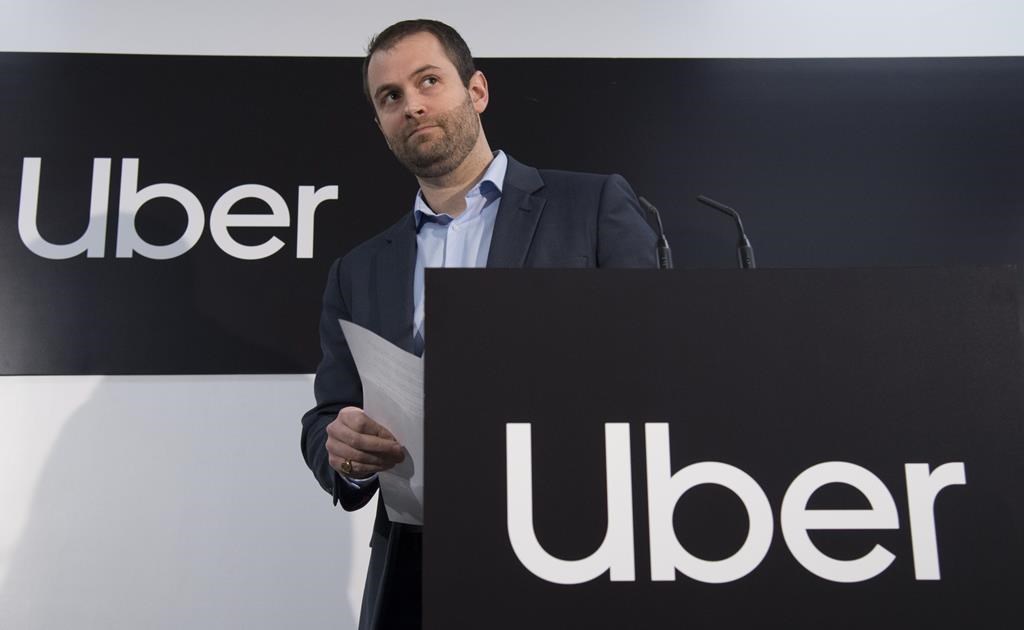 Michael van Hemmen, head of Western Canada for Uber, addresses the media during a news conference in Vancouver B.C, Wednesday, January, 29, 2020. The mayor of the Metro Vancouver city of Surrey has stood down in his fight against ride-hailing, saying it's "time to move on" after a judge ordered the municipality to stop ticketing Uber drivers. THE CANADIAN PRESS/Jonathan Hayward.