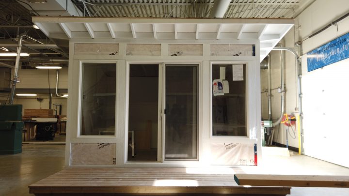 Students have started painting the backyard studio, which will be transported to the new owner’s property when the time comes.