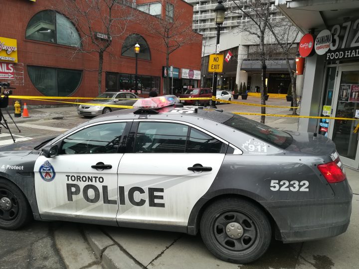 Police at the scene of a shooting near Yonge and Gerrard streets Sunday morning.