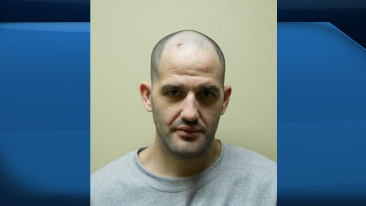 Jamie Dryden was arrested in Brantford on Friday by multiple police services on a Canada-wide warrant, say police.