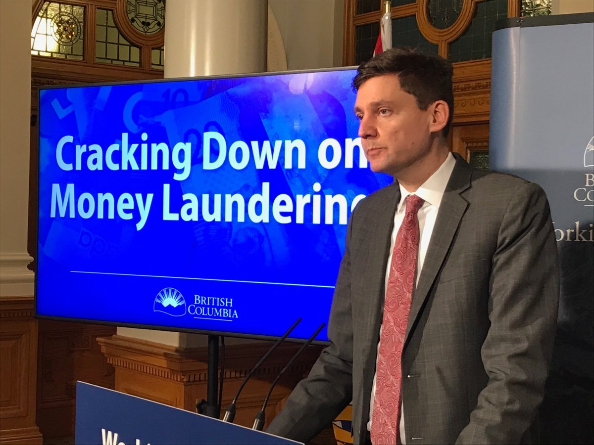 Attorney General David Eby speaks to reporters before the province's money laundering inquiry begins. 
