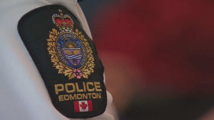 A file photo of an Edmonton police crest on white shirt.