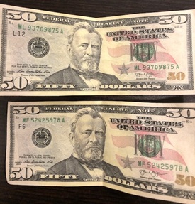 Cobourg police say counterfeit US$50 bills have been used at several businesses.