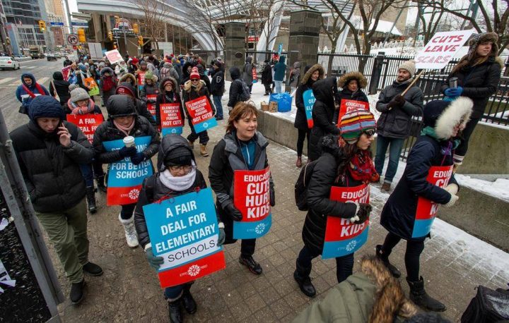 Striking Ontario teachers protest in downtown Toronto on Thursday, February 6, 2020.