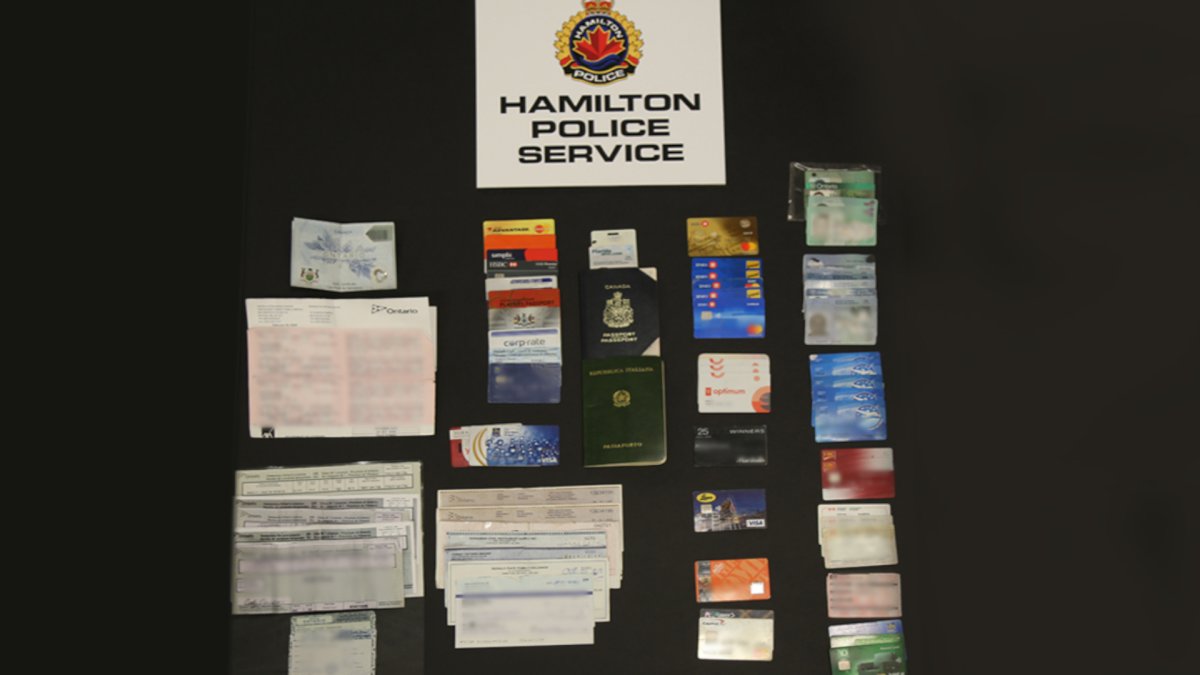 A couple who were arrested at the Sheraton hotel in downtown Hamilton had a number of credit cards and I.D. that didn't belong to them, say police.