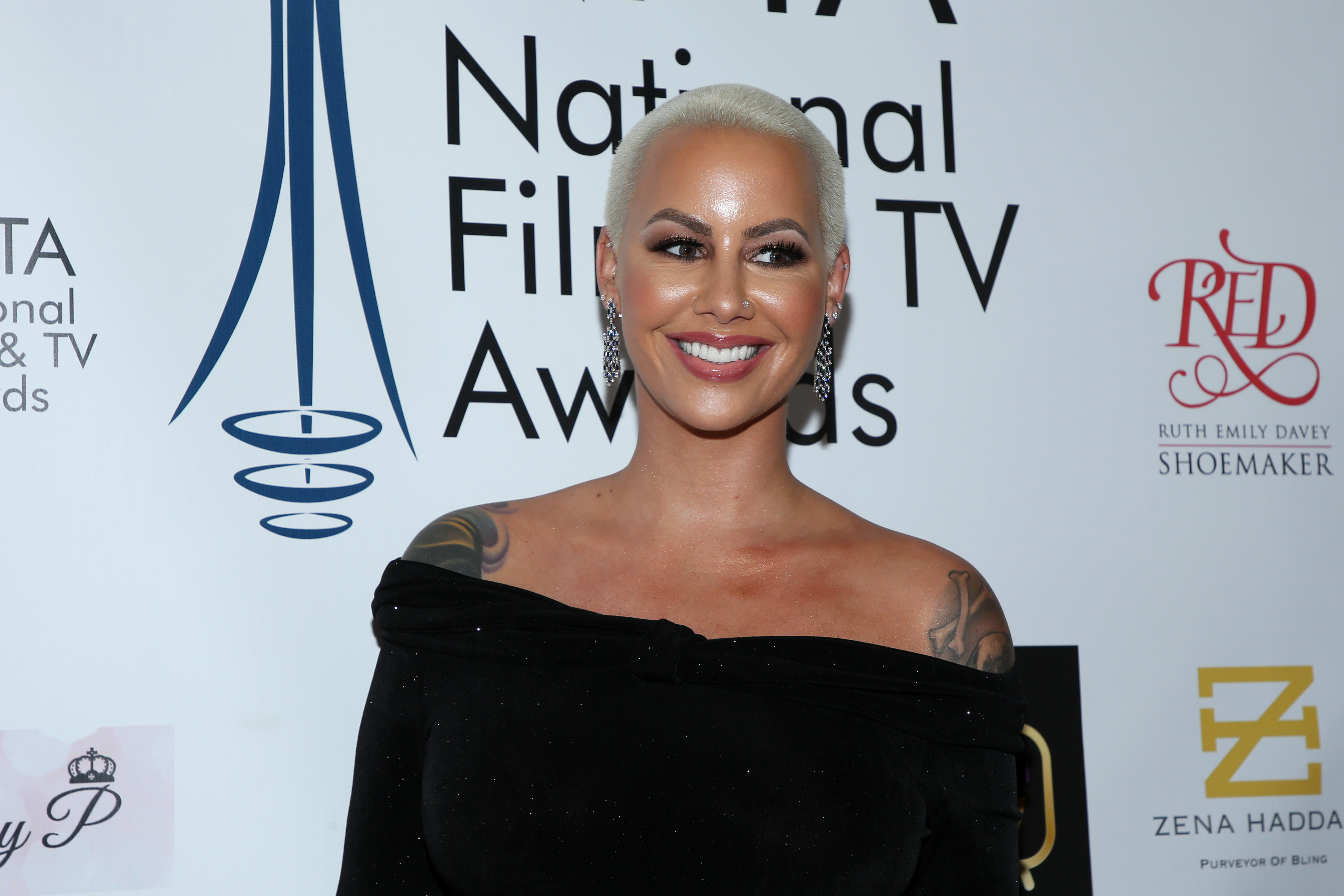 Amber Rose Gets Giant Forehead Tattoos in Honor of Her Sons Pics