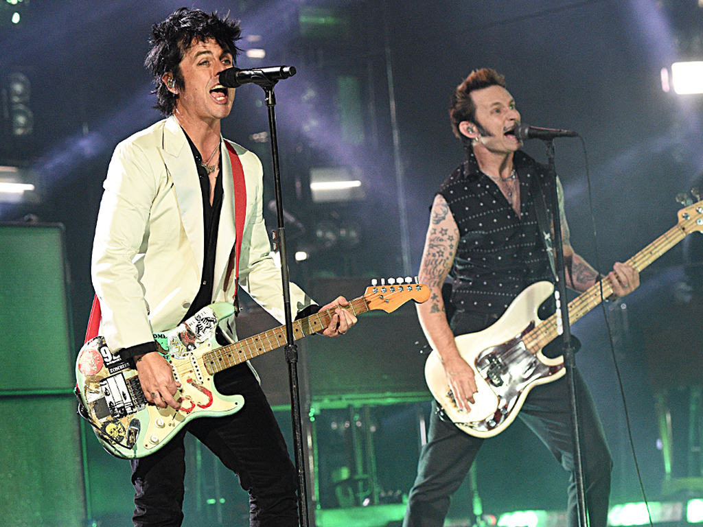 Billie Joe Armstrong and Mike Dirnt of Green Day perform onstage during the 2019 American Music Awards at Microsoft Theater on Nov. 24, 2019 in Los Angeles, Calif.