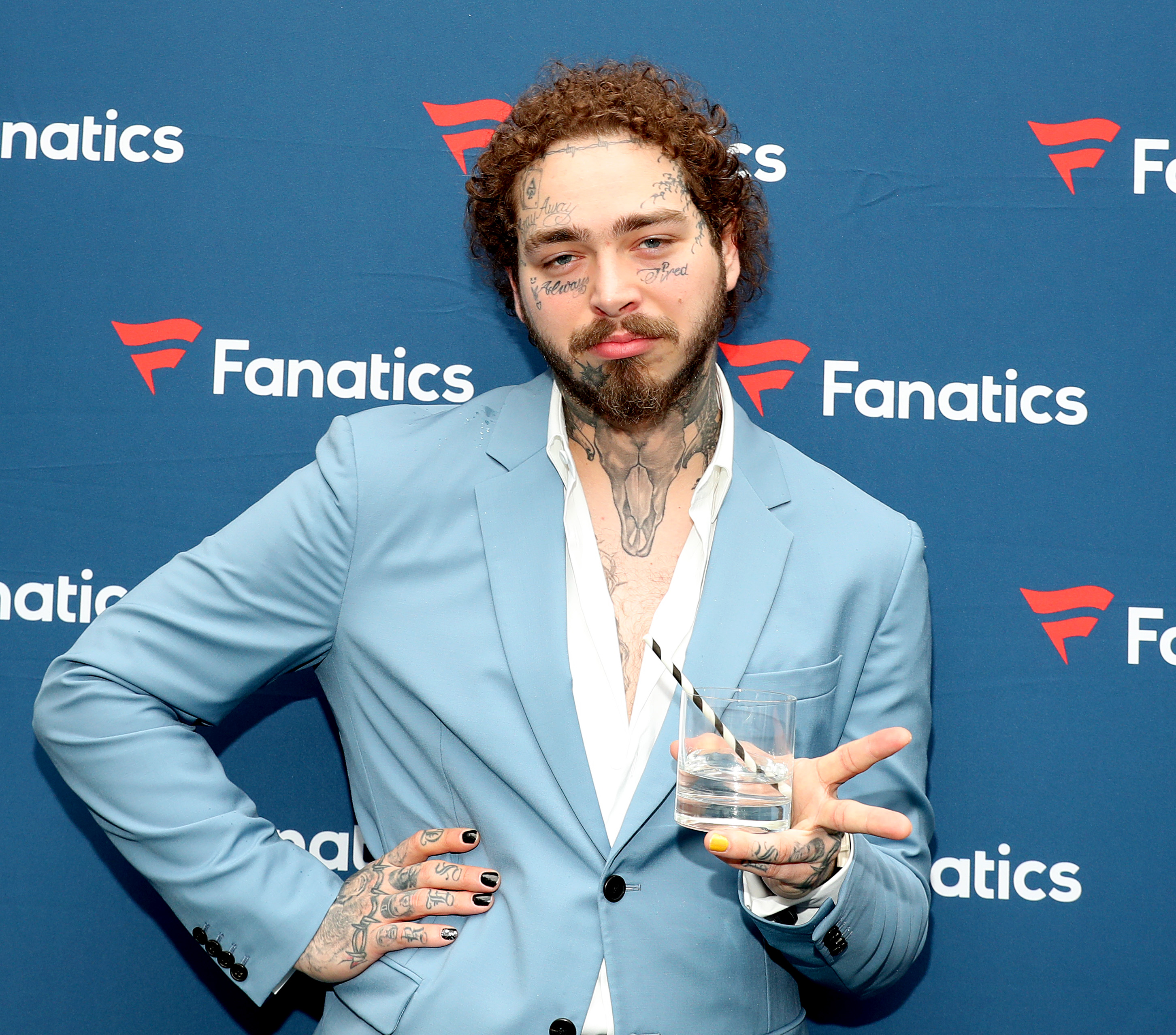 Post Malone debuts brutal new face tattoo closing year of weird and  wonderful celebrity ink  Newshub