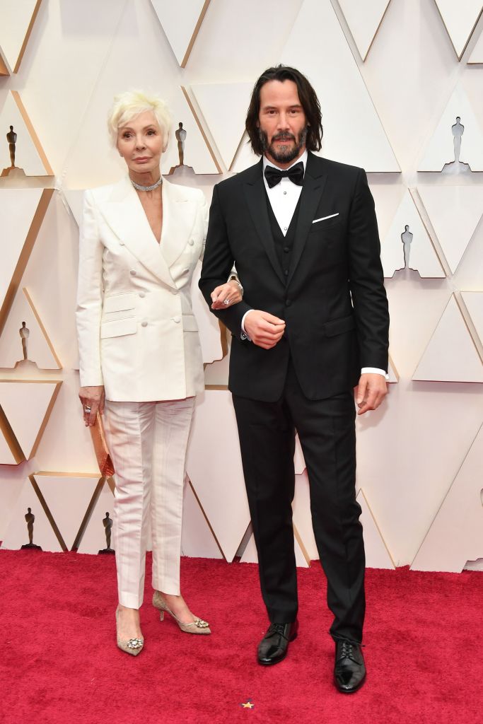 Patricia Taylor (L) and Keanu Reeves attend the 92nd Annual Academy Awards at Hollywood and Highland on Feb. 09, 2020, in Hollywood, Calif. (Photo by Amy Sussman/Getty Images)