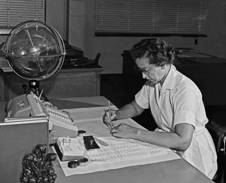 HAMPTON, VA - 1962:  NASA space scientist, and mathematician Katherine Johnson poses for a portrait at her desk with an adding machine and a 'Celestial Training device' at NASA Langley Research Center in 1962 in Hampton, Virginia.  (Photo by NASA/Donaldson Collection/Getty Images).