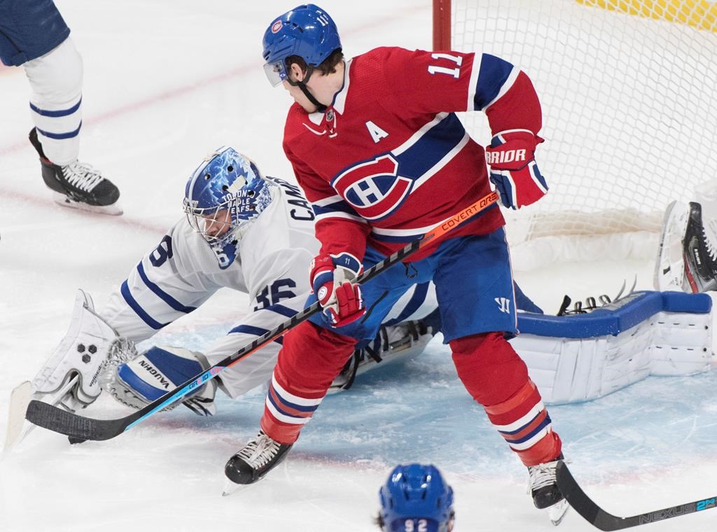 Toronto Maple Leafs goaltender Jack Campbell makes a save against Montreal Canadiens' Brendan Gallagher during NHL action in Montreal, Saturday, Feb. 8, 2020.