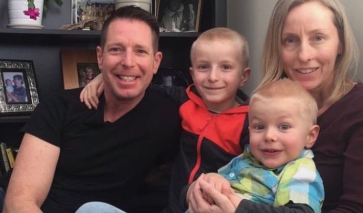 A photo of Mike and Erin Cochlin, with sons Liam and Quinn.