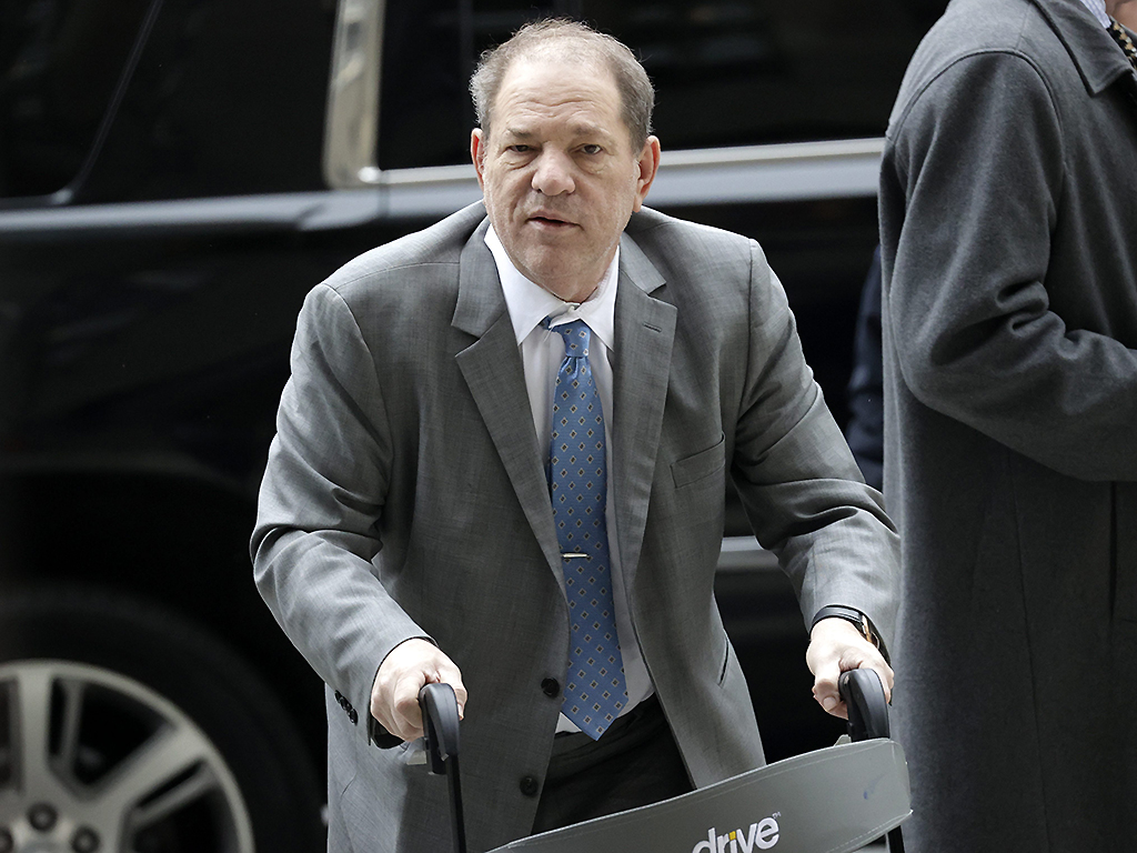 Harvey Weinstein arrives with his lawyers for his sexual assault trial at New York State Supreme Court in New York City on Feb. 18, 2020.