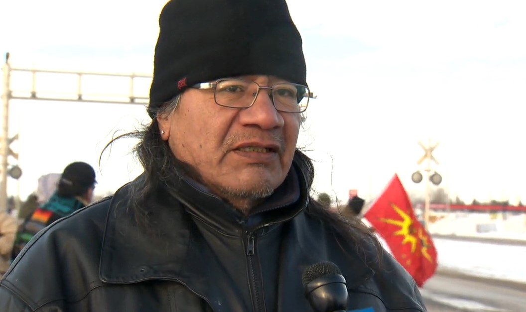 Mike Hawkins said he was injured when a semi-trailer drove through the blockade.