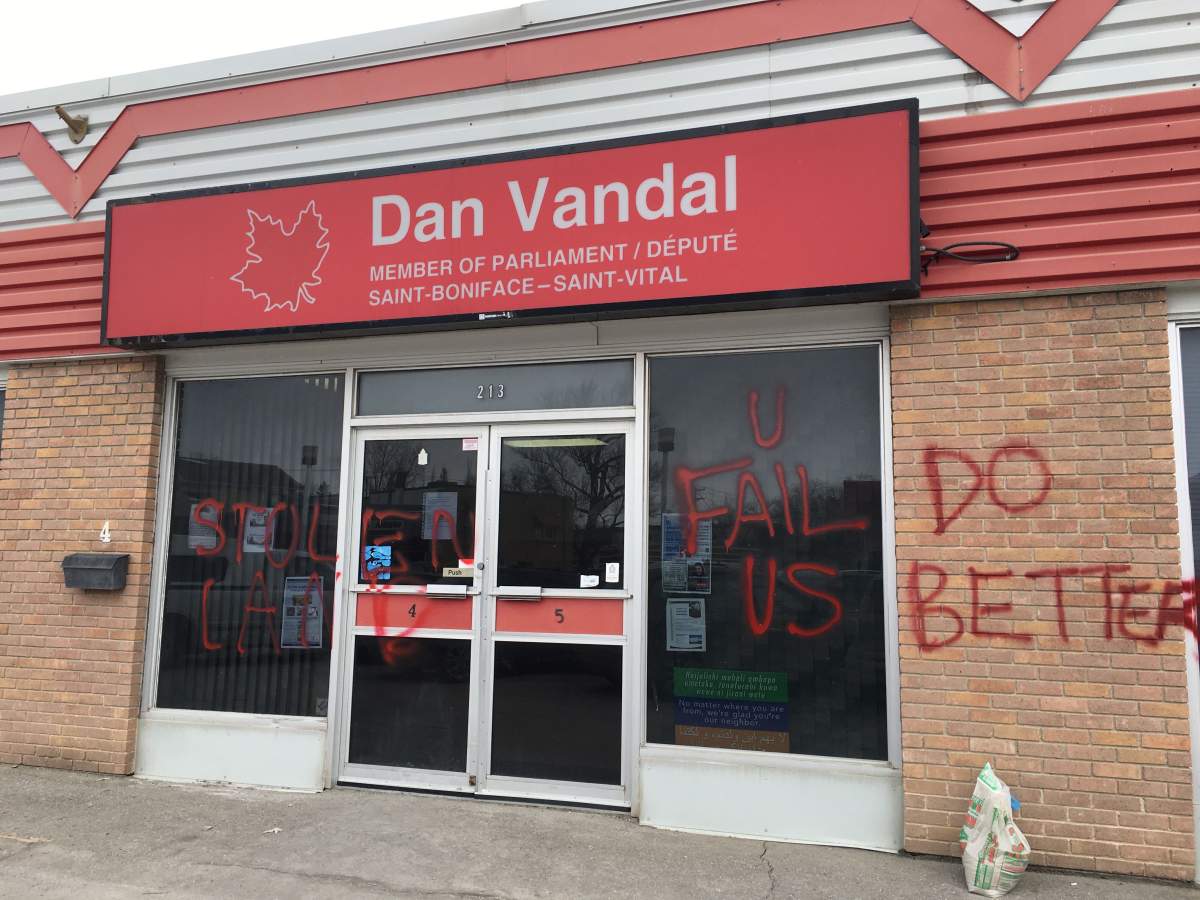Graffiti sprayed at MP Dan Vandal’s office Wednesday.