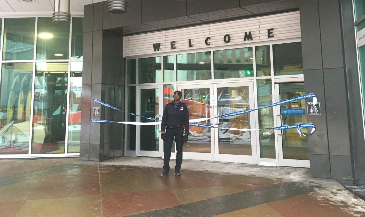 A security guard outside the City Centre Mall on 102A Avenue in downtown Edmonton on Thursday, Feb. 13, 2020.