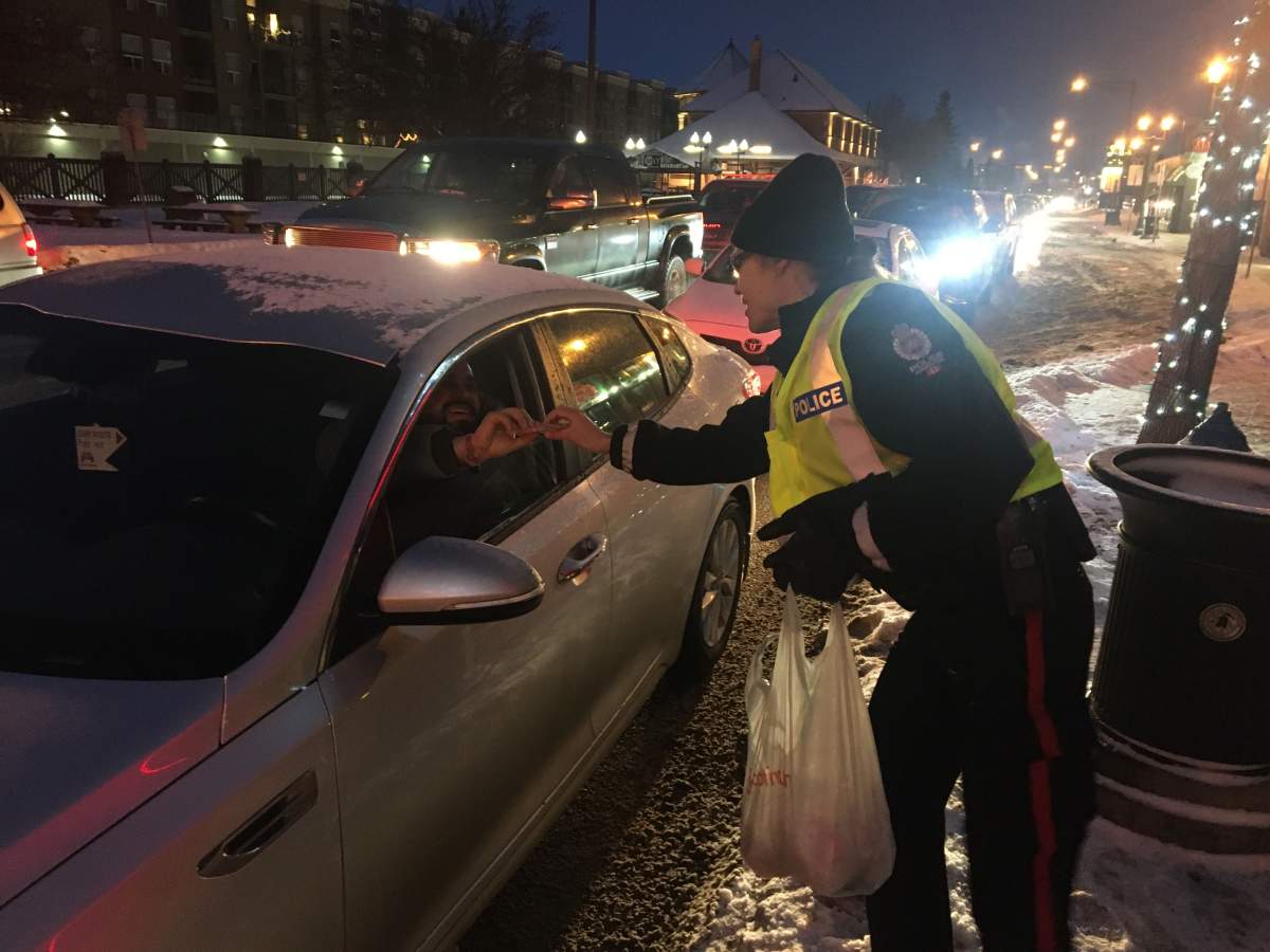 Edmonton police members were handing out Valentine’s Day cookies reminding people not to engage in distracted driving on on Friday, Feb. 14, 2020.