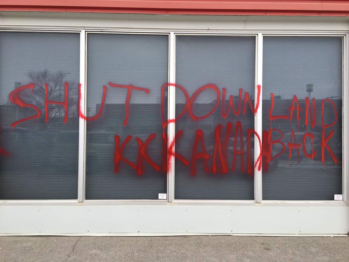 Graffiti sprayed at MP Dan Vandal’s office Wednesday.