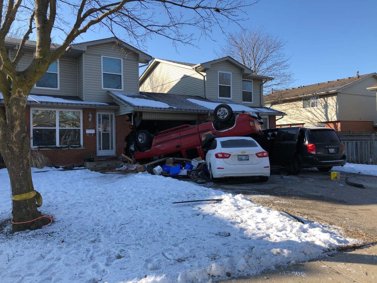 A pickup truck lays upside down following a crash on Jalna Boulevard near Sholto Drive.