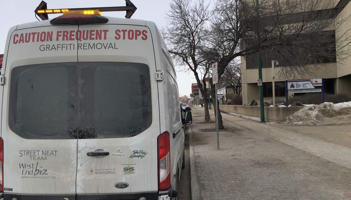 Clean up crews arrive at RCMP headquarters Wednesday morning.