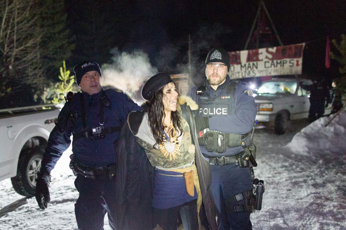RCMP make an arrest as they enforce an injunction over a contested natural gas pipeline near Houston, B.C.