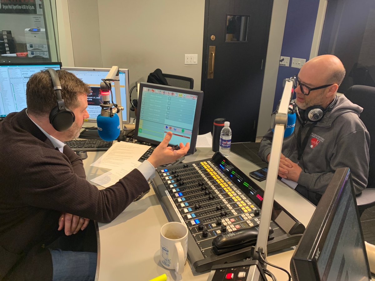 Ryan Jespersen speaks with chef Brad Smoliak as the two auction off a dinner package to raise money for the Mazankowski Alberta Heart Institute ahead of 630 CHED Heart Pledge Day.