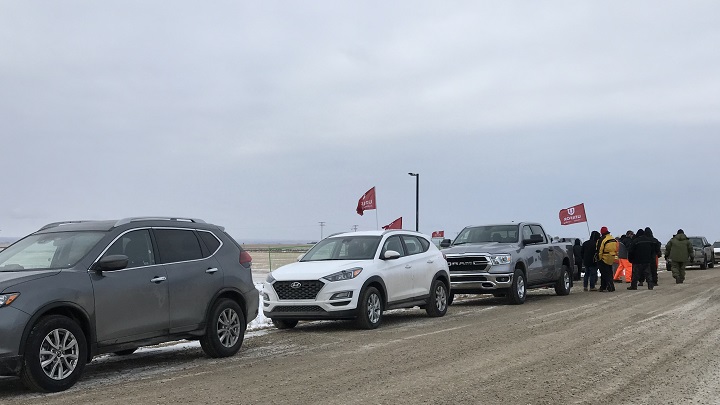 Unifor picketers have gathered around a Co-op bulk storage facility near Moose Jaw, Sask.