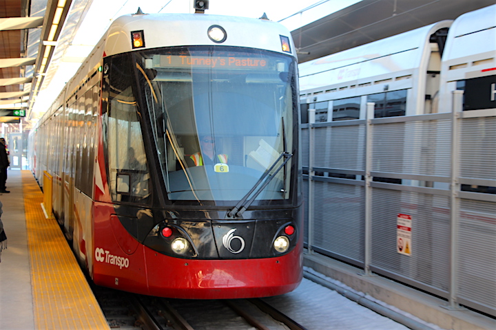OC Transpo trains are seen on Line 1.