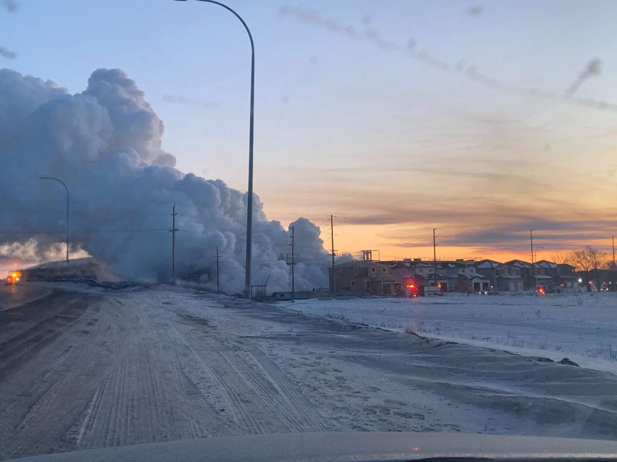 Smoke from the wreckage Sunday morning.