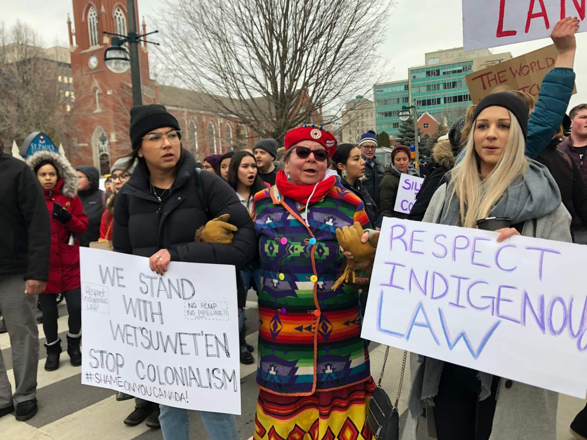 Protesters march through downtown London to show solidarity with the Wet'suwet'en First Nation.