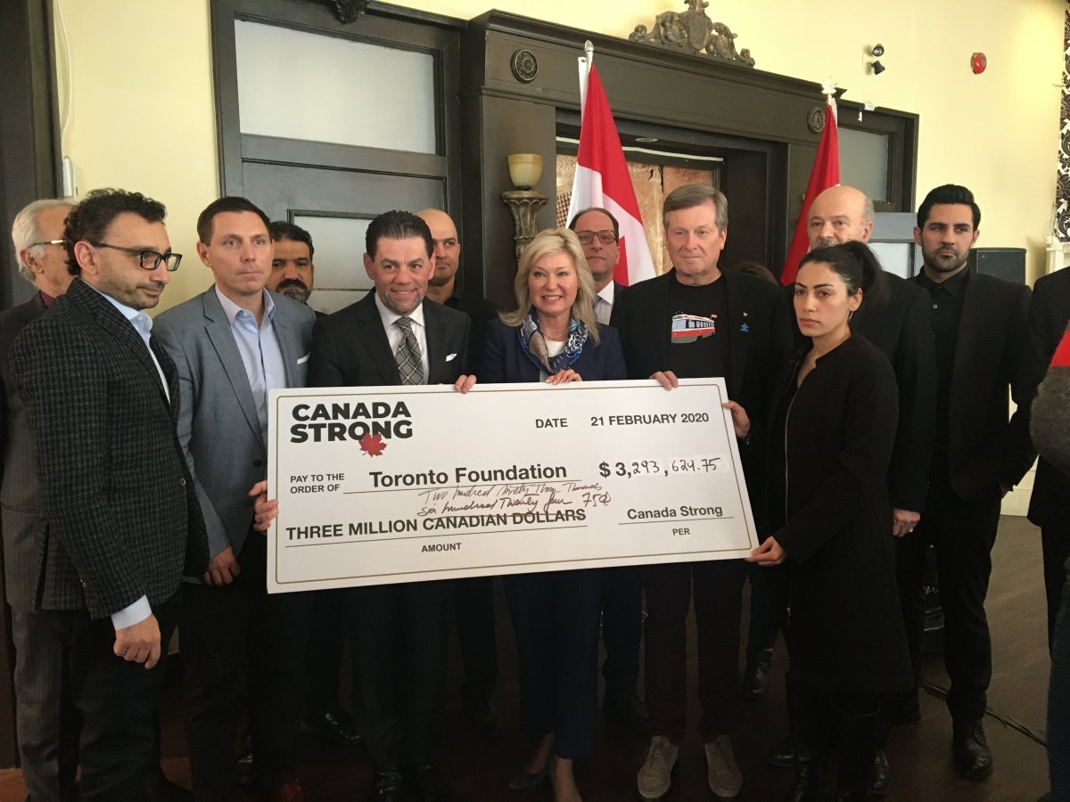 The Canada Strong fundraising initiative, launched by Mohamad Fakih, the CEO of Paramount Fine Foods (fifth from left), announced it had raised $3,293,624.75 for the families though donations and a pledge by the federal government to match contributions up to $1.5 million.
