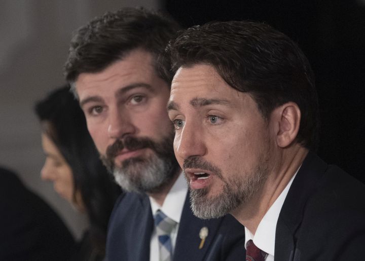 Edmonton Mayor Don Iveson looks on as Canadian Prime Minister Justin Trudeau delivers opening remarks at the start of a meeting with Mayors of Canada's largest cities in Ottawa, Thursday February 6, 2020. 