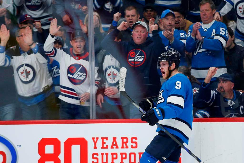 Winnipeg Jets' Andrew Copp (9) celebrates his goal against the St. Louis Blues during second period NHL action in Winnipeg on Saturday, February 1, 2020. THE CANADIAN PRESS/John Woods.