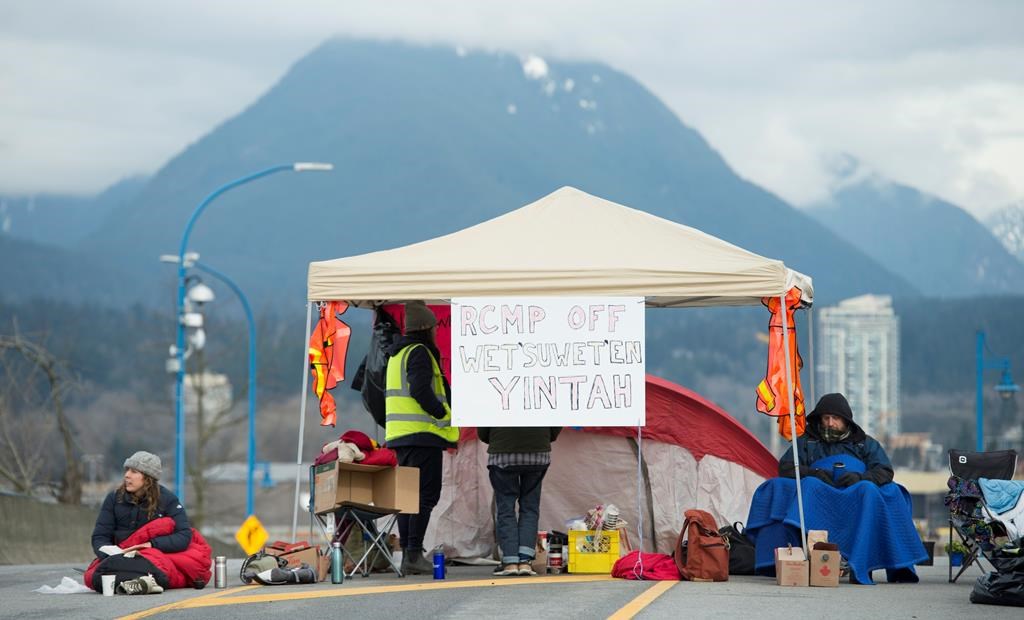 Protesters block the road access to one of Vancouver’s port entrances on Sunday, February 9, 2020. THE CANADIAN PRESS/Jonathan Hayward