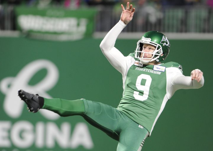 Saskatchewan Roughriders punter Jon Ryan follows through on a punt during second half CFL action against the Winnipeg Blue Bombers, in Regina on Saturday, Oct. 5, 2019. 