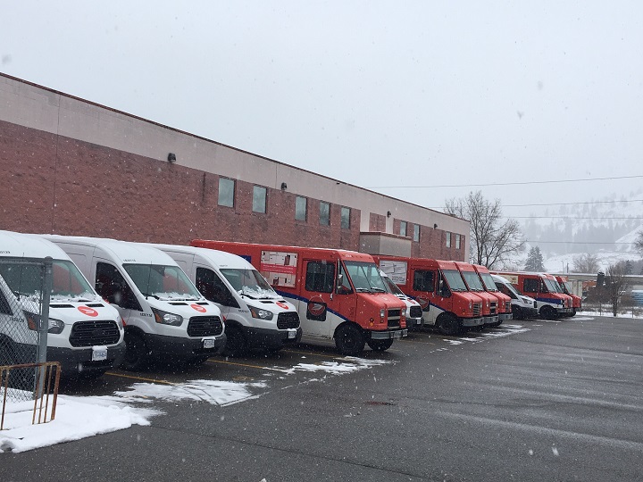 Canada Post trucks in Kelowna on Thursday.